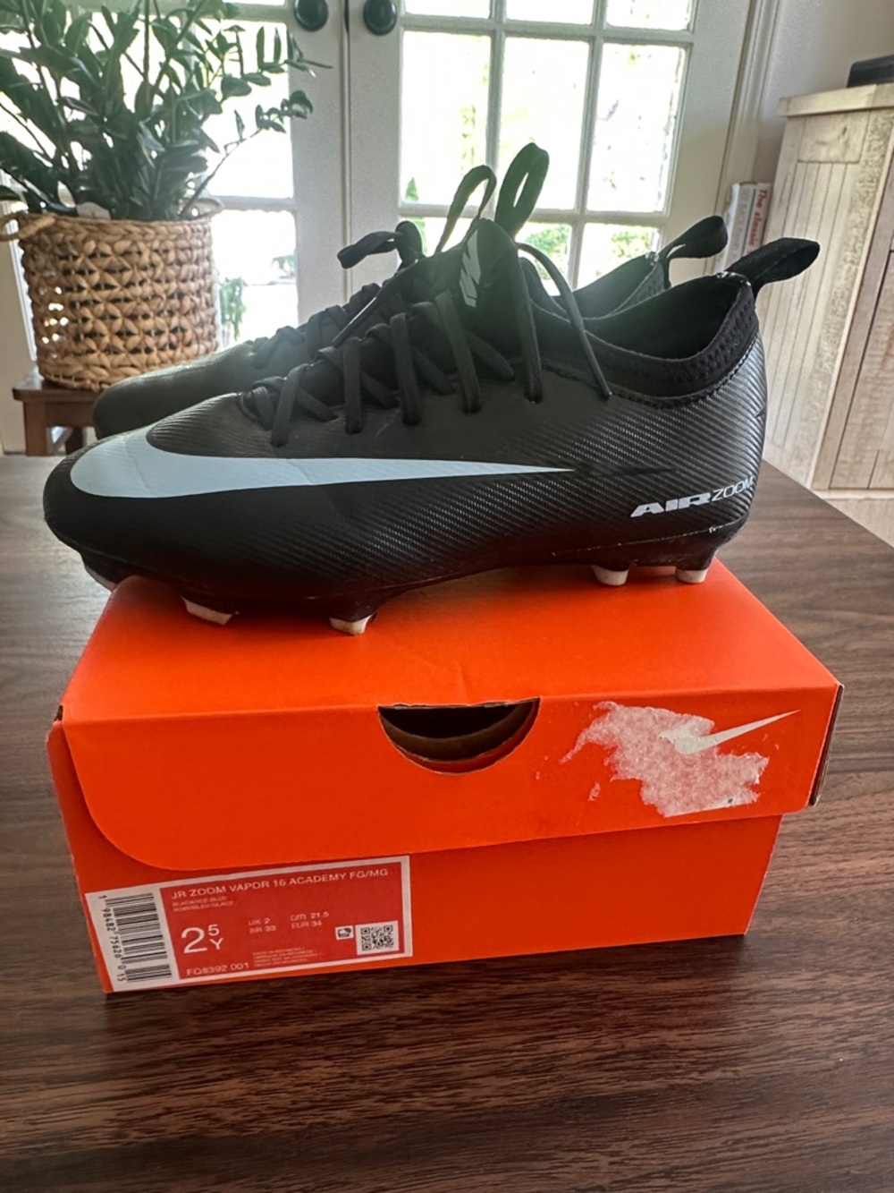 Nike Black Soccer Cleats with Blue Swoosh - Worn Once
